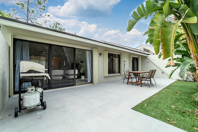 rear view of house featuring a patio area