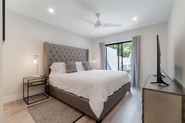 bedroom featuring access to outside, ceiling fan, and light wood-type flooring