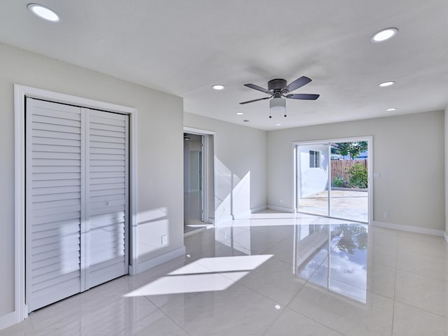 tiled bedroom featuring access to outside and ceiling fan