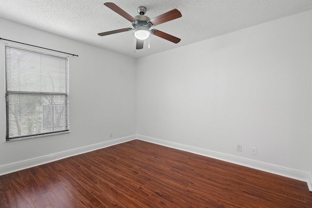 empty room with hardwood / wood-style floors, a textured ceiling, and ceiling fan