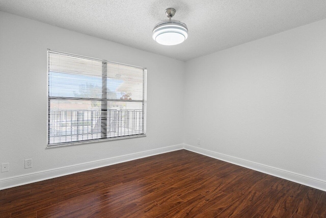 unfurnished room featuring hardwood / wood-style floors