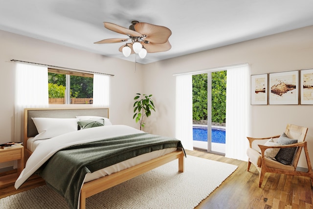 bedroom featuring hardwood / wood-style flooring, access to exterior, and ceiling fan