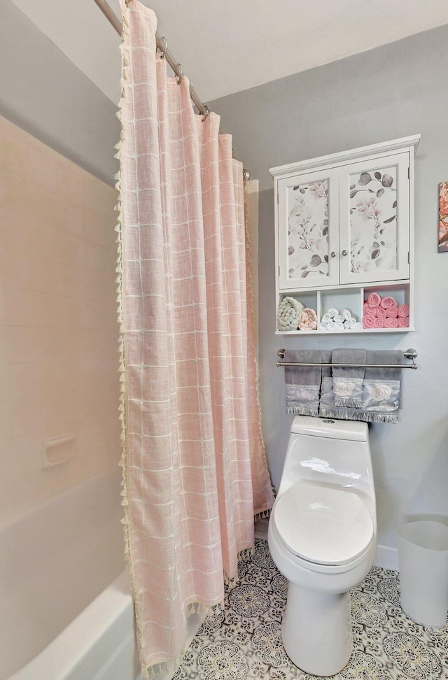 bathroom with toilet and shower / bathtub combination with curtain