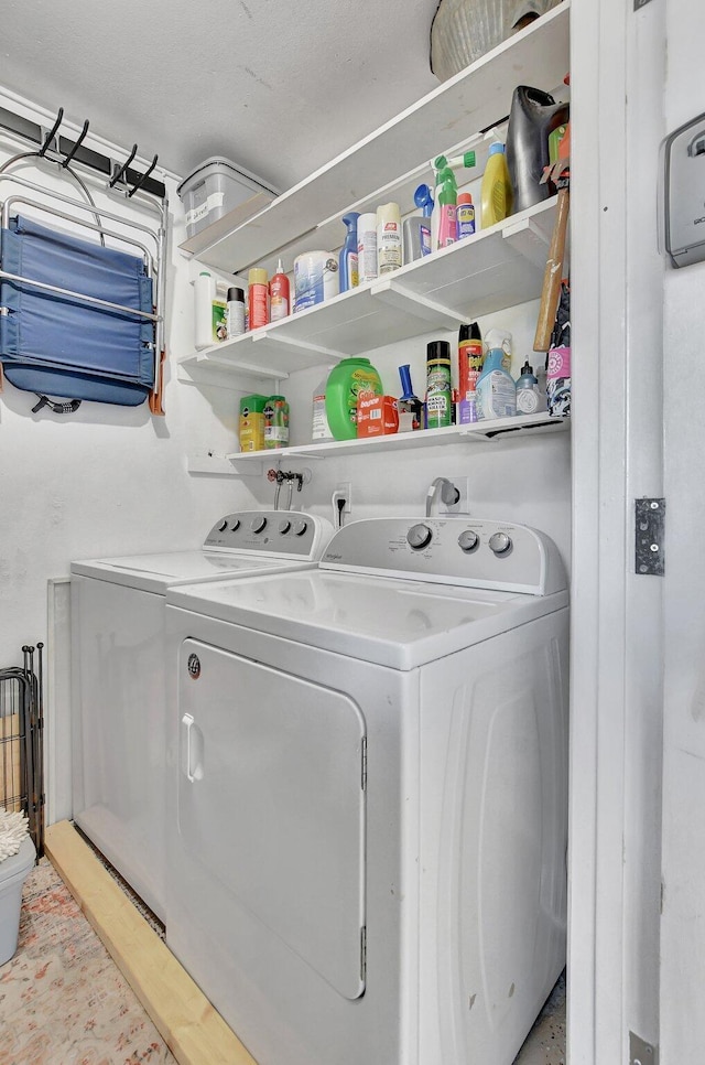 washroom with separate washer and dryer