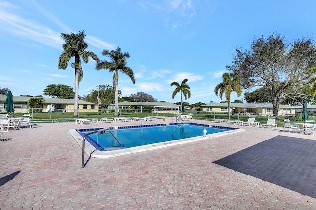 view of swimming pool featuring a patio