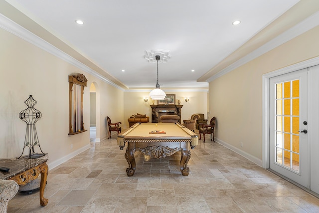 rec room with ornamental molding, plenty of natural light, and billiards