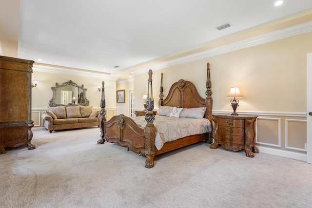 bedroom featuring ornamental molding and light colored carpet