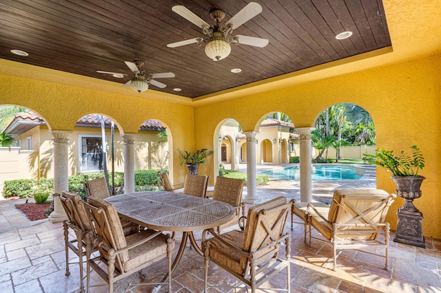 view of patio / terrace featuring ceiling fan