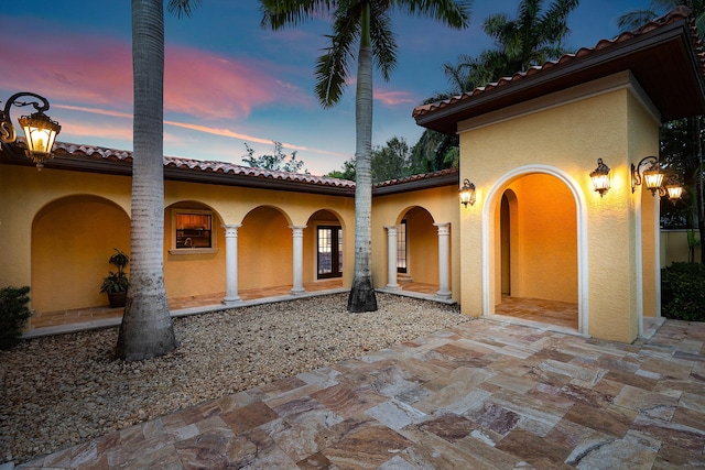 view of front facade with a patio area