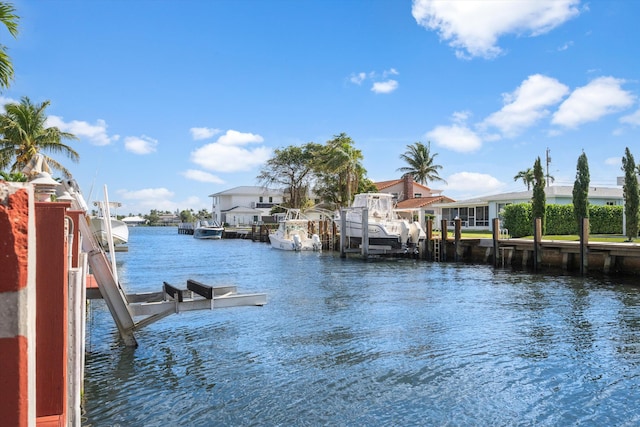 view of water feature with a dock