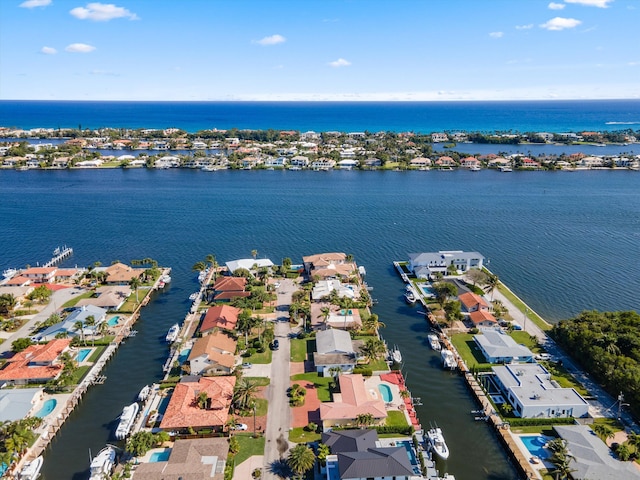 drone / aerial view with a water view