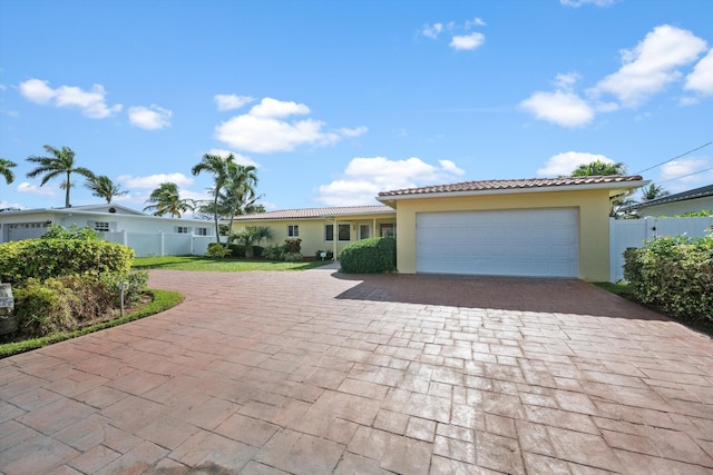 view of front of property with a garage