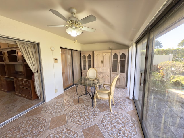 sunroom / solarium with vaulted ceiling and ceiling fan