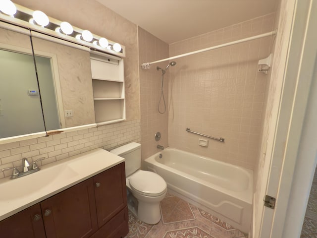 full bathroom featuring tasteful backsplash, vanity, tile walls, toilet, and tiled shower / bath