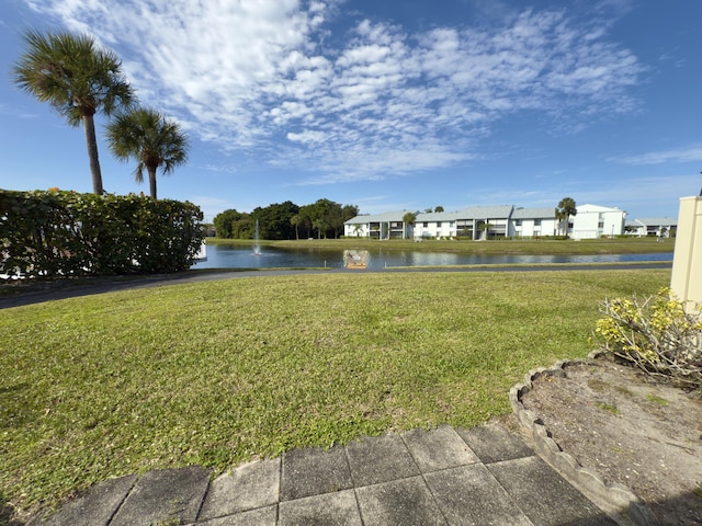 view of yard with a water view