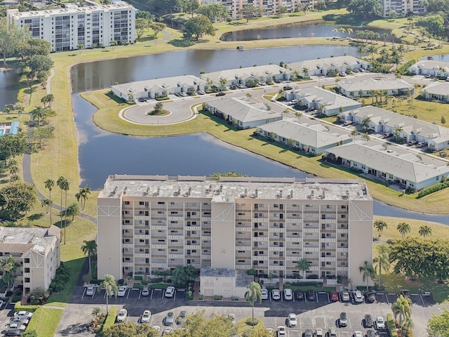 drone / aerial view with a water view