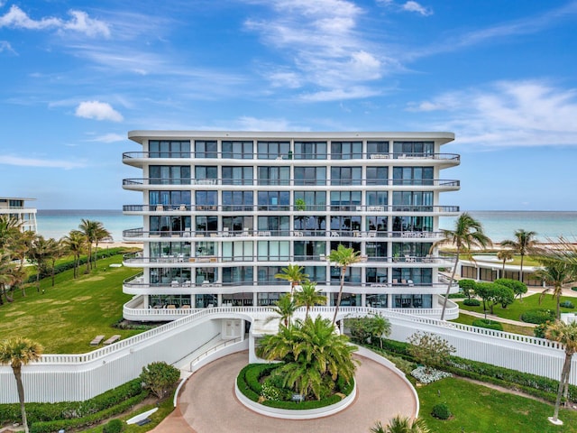 view of building exterior with a water view