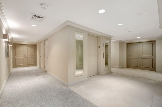 hallway featuring crown molding