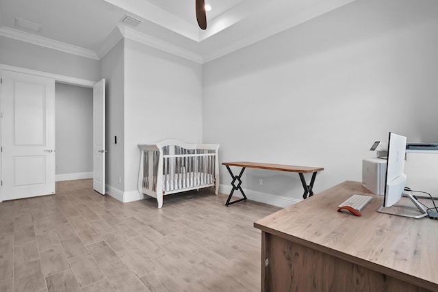 bedroom featuring baseboards, visible vents, ceiling fan, ornamental molding, and light wood-style floors