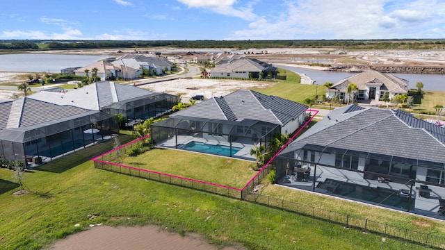 aerial view featuring a water view and a residential view