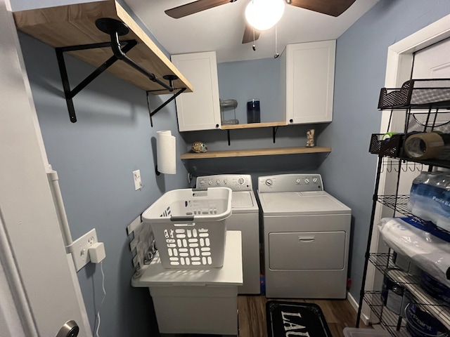 laundry area with ceiling fan, cabinets, dark hardwood / wood-style floors, and washing machine and dryer