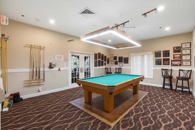 recreation room with dark colored carpet, billiards, and french doors