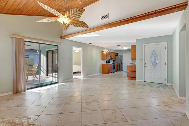 interior space with light tile patterned floors, wood ceiling, and ceiling fan