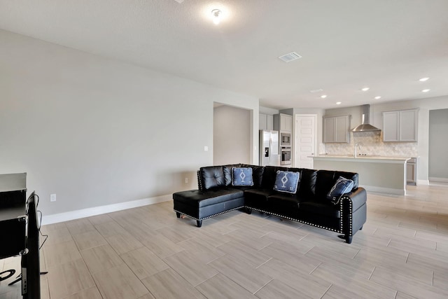 living room with sink