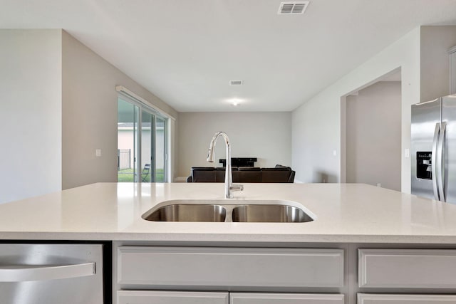 kitchen with sink and stainless steel appliances