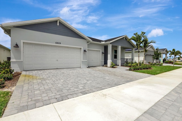 single story home featuring a garage