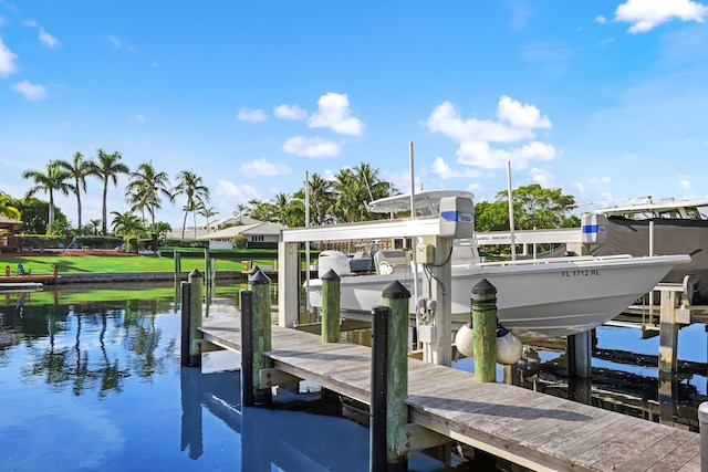 dock area featuring a water view and boat lift