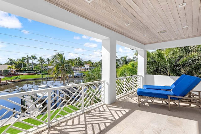 view of patio / terrace with a water view