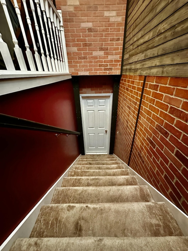 stairway with wooden walls