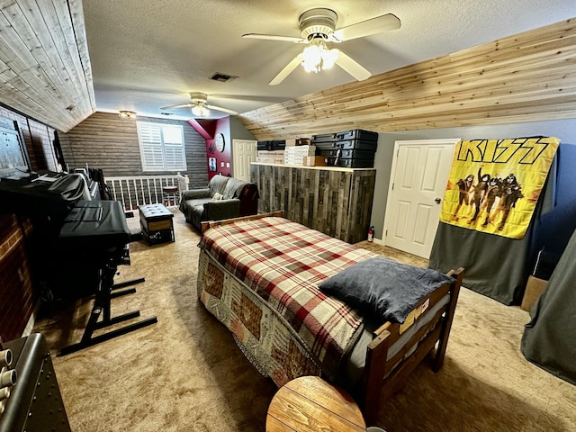 carpeted bedroom featuring ceiling fan, wooden ceiling, a textured ceiling, and vaulted ceiling