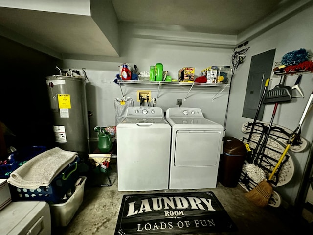 washroom featuring washing machine and dryer, electric water heater, and electric panel