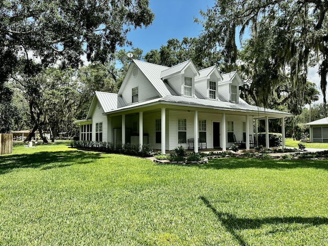 view of side of property featuring a yard