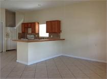 kitchen featuring kitchen peninsula and light tile patterned floors