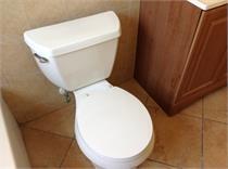 bathroom featuring tile patterned floors and toilet