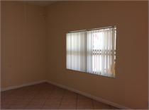 spare room featuring tile patterned floors