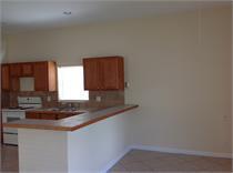 kitchen with stove and kitchen peninsula