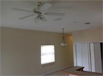 empty room featuring ceiling fan