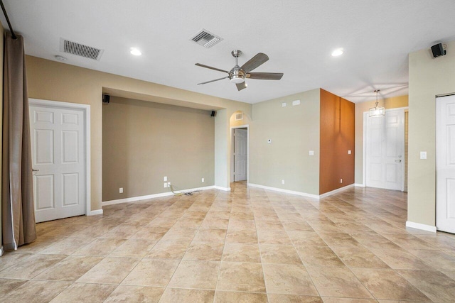 unfurnished room featuring ceiling fan