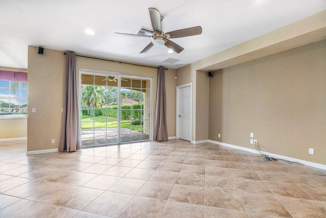 spare room with ceiling fan