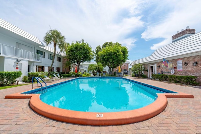 view of pool with a patio area