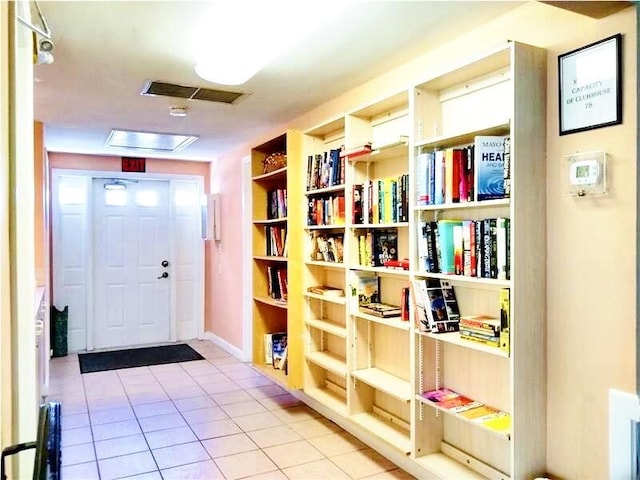 interior space featuring light tile patterned floors