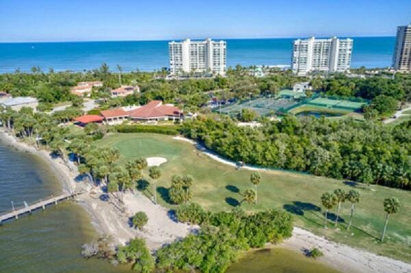 drone / aerial view with a water view