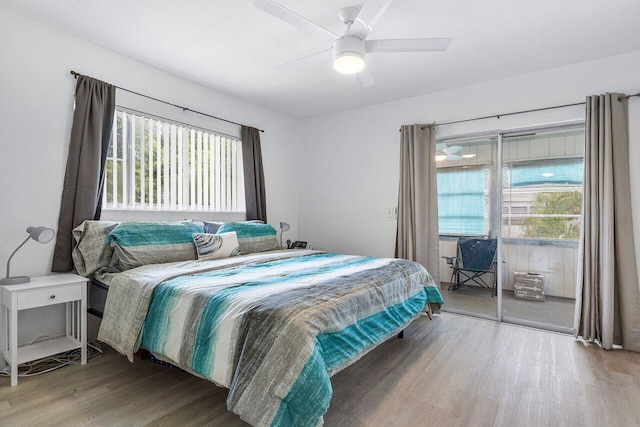 bedroom with hardwood / wood-style flooring and ceiling fan