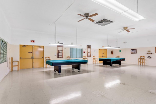 game room featuring pool table, ceiling fan, and a high ceiling