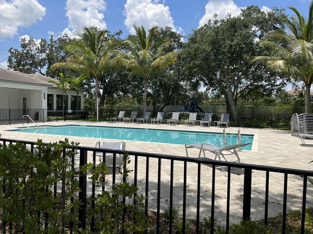 view of front of house with a front lawn and a garage