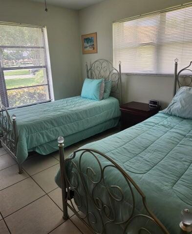 bedroom with tile patterned floors